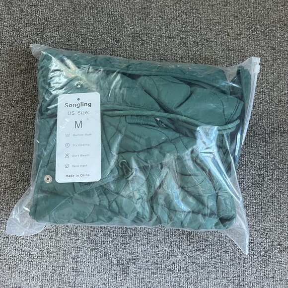 Green Quilted Puffer Jacket - Picture 12 of 13